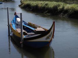 traditional boat Aveiro lagoon Ria de Aveiro located on the Atlantic coast of Portugal photo