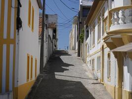 Striped Painted houses in Beach Praia Costa Nova do Prado in Aveiro Portugal photo