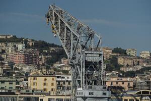 Langer Heinrich crane in genoa harbor historical floating crane, built in Germany in 1915, still working, and currently in service at the port. photo