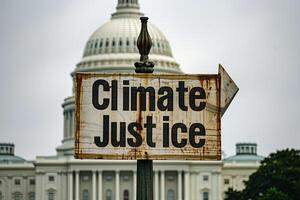 Climate Justice text on a banner outside the Capitol in washington dc photo