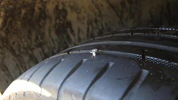 Metal Screw In Run Flat Tire Closeup photo