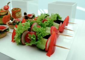 Vegetables appetizers and starters served for food reception stock photo