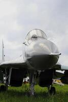 Nose And Cockpit Of Modern Combat Fighter Landed At Military Base photo