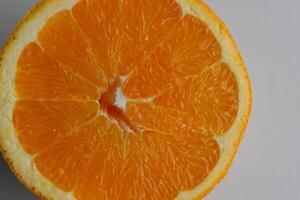 Wet Surface Of Orange Fruit Slice Isolated On White Background Stock Photo