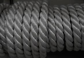 Rolled composite cord closeup texture background photo