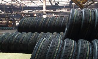 Produced tires storage at rubber production plant stock photo