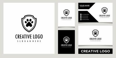 Paw dog with shield logo template with business card design vector