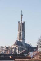 Basilica of Hulst. An ancient cathedral with a unique tower in the Dutch town of Hulst. The landmark of the city photo