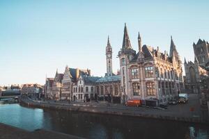 Ghent promenade called the Graslei and the charming historic houses at sunrise. The centre of the Belgian city. Flanders photo