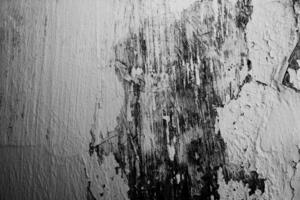 Blend grunge, dust, and scratch textures. The abstract background features monochrome tones with black and white highlights. photo