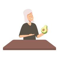 Smiling woman presenting avocado in kitchen vector