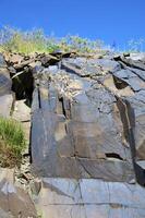 Petroglyphs within the Archaeological Landscape of Tamgaly. Almaty area, Kazakhstan photo