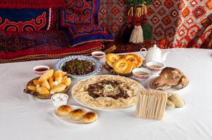 National Kazakh dishes, Beshparmak, Manty, Baursak photo