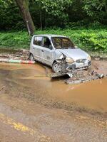 Tanah Datar, Indonesia - May 12, 2024. the condition of the car was badly damaged due to cold lava flash floods. Natural Disaster in Lembah Anai photo