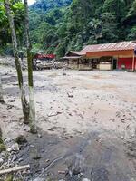 Tanah Datar, Indonesia - May 12, 2024. condition of the Mato Aia water park which was affected by cold lava flash floods, natural disasters in Sepuluh Koto, Tanah Datar, West Sumatra, Indonesia photo