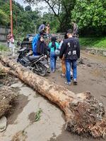 Tanah Datar, Indonesia - May 12, 2024. Piles of rubbish after cold lava flash flood, natural disaster in Anai Valley, Sepuluh Koto, Tanah Datar Regency, West Sumatra, Indonesia photo