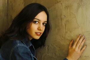 A portrait of a young woman in the studio photo