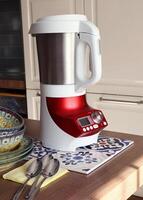 Electric soup maker and chopper. Makes puree soup in 30 minutes. Modern object for the kitchen. Electric soup maker and chopper. Makes puree soup in 30 minutes. Modern object for the kitchen. photo