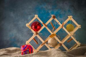 Christmas toy on natural sackcloth background photo