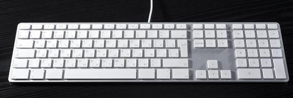 The white mouse and the keyboard for the computer photo