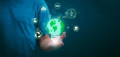 Carbon Dioxide Reduction To solve the global climate crisis and reduce global warming. Concept of reducing carbon dioxide emissions to zero for the goal of reducing greenhouse gas emissions in 2050 photo