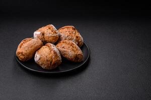 Fresh baked bread buns with salt, spices, seeds and grains photo