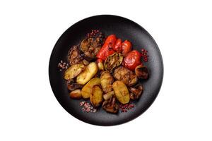 Delicious juicy grilled vegetables potatoes, tomatoes, peppers, eggplant photo