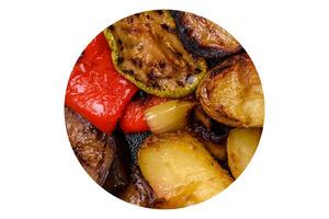 Delicious juicy grilled vegetables potatoes, tomatoes, peppers, eggplant photo