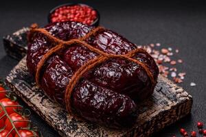 Delicious black blood sausage or black pudding with spices and herbs photo