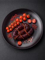 Delicious black blood sausage or black pudding with spices and herbs photo