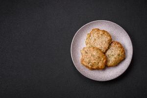 Delicious fried minced chicken cutlets with salt, spices and herbs photo