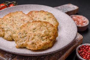 Delicious fried minced chicken cutlets with salt, spices and herbs photo
