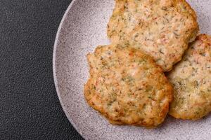 Delicious fried minced chicken cutlets with salt, spices and herbs photo