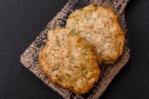 Delicious fried minced chicken cutlets with salt, spices and herbs photo