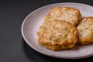 Delicious fried minced chicken cutlets with salt, spices and herbs photo
