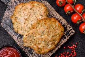 Delicious fried minced chicken cutlets with salt, spices and herbs photo