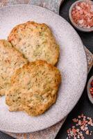 Delicious fried minced chicken cutlets with salt, spices and herbs photo