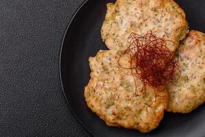 Delicious fried minced chicken cutlets with salt, spices and herbs photo
