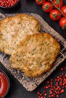 Delicious fried minced chicken cutlets with salt, spices and herbs photo