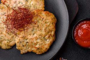 Delicious fried minced chicken cutlets with salt, spices and herbs photo