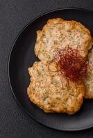 Delicious fried minced chicken cutlets with salt, spices and herbs photo