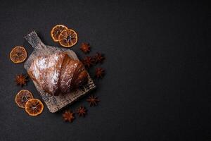 Delicious fresh sweet crispy croissant with chocolate photo