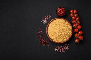 Raw stelline pasta from durum wheat with salt and spices photo