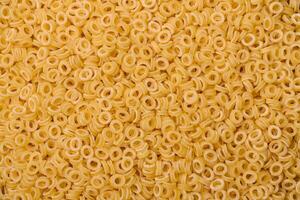 Raw anellini pasta from durum wheat with salt and spices photo