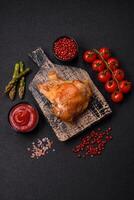 Delicious juicy chicken thighs baked on the grill with salt photo