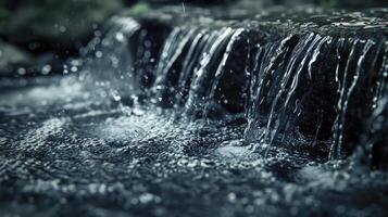 waterfall in the dark forest photo