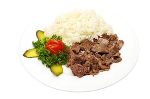 A plate of chilli con carne with rice over a white background photo