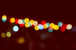 Color Bokeh against a dark photo