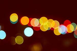 Color Bokeh against a dark photo