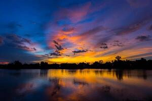 silhouette twilight sky on lagoon photo